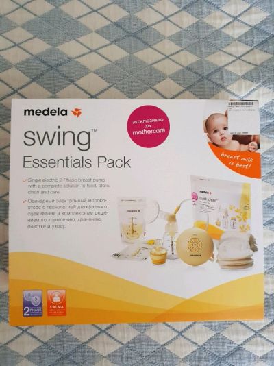 Лот: 11646432. Фото: 1. Молокоотсос Medela swing. Всё для кормления