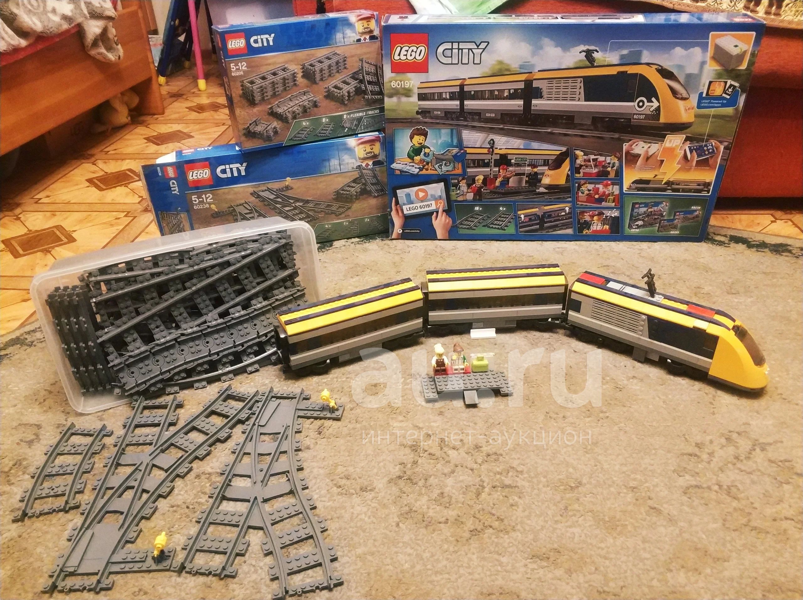 Lego Train Пассажирский поезд 60197 + рельсы 60205 + стрелки 60238 + датчик  света и расстояния 88007 — купить в Красноярске. Состояние: Б/у.  Конструкторы на интернет-аукционе Au.ru