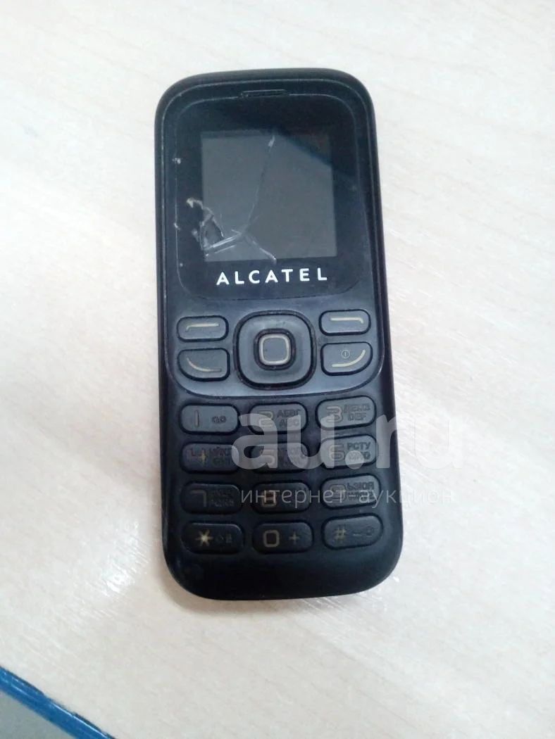 №1079 . Телефон Alcatel onetouch 232 . — купить в Красноярске. Состояние:  Неисправно. Кнопочные мобильные телефоны на интернет-аукционе Au.ru